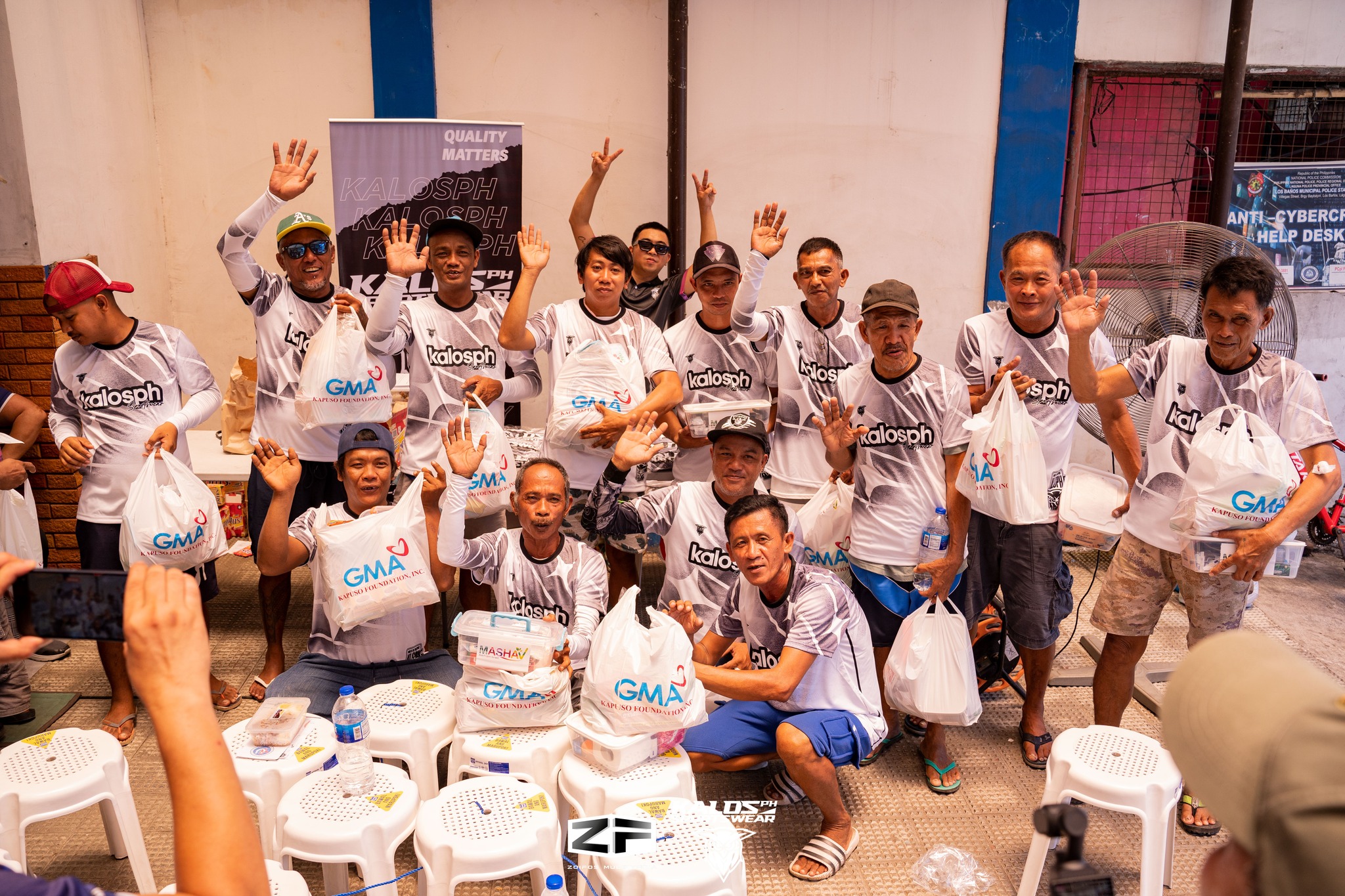 KALOSph donates custom shirts to trolley operators during Father's Day outreach in Laguna with GMA Kapuso Foundation – custom jersey Philippines